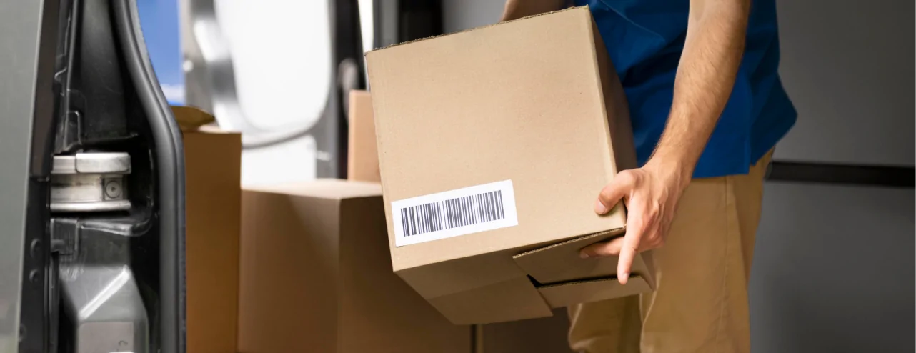 close-up-hands-carrying-box 1